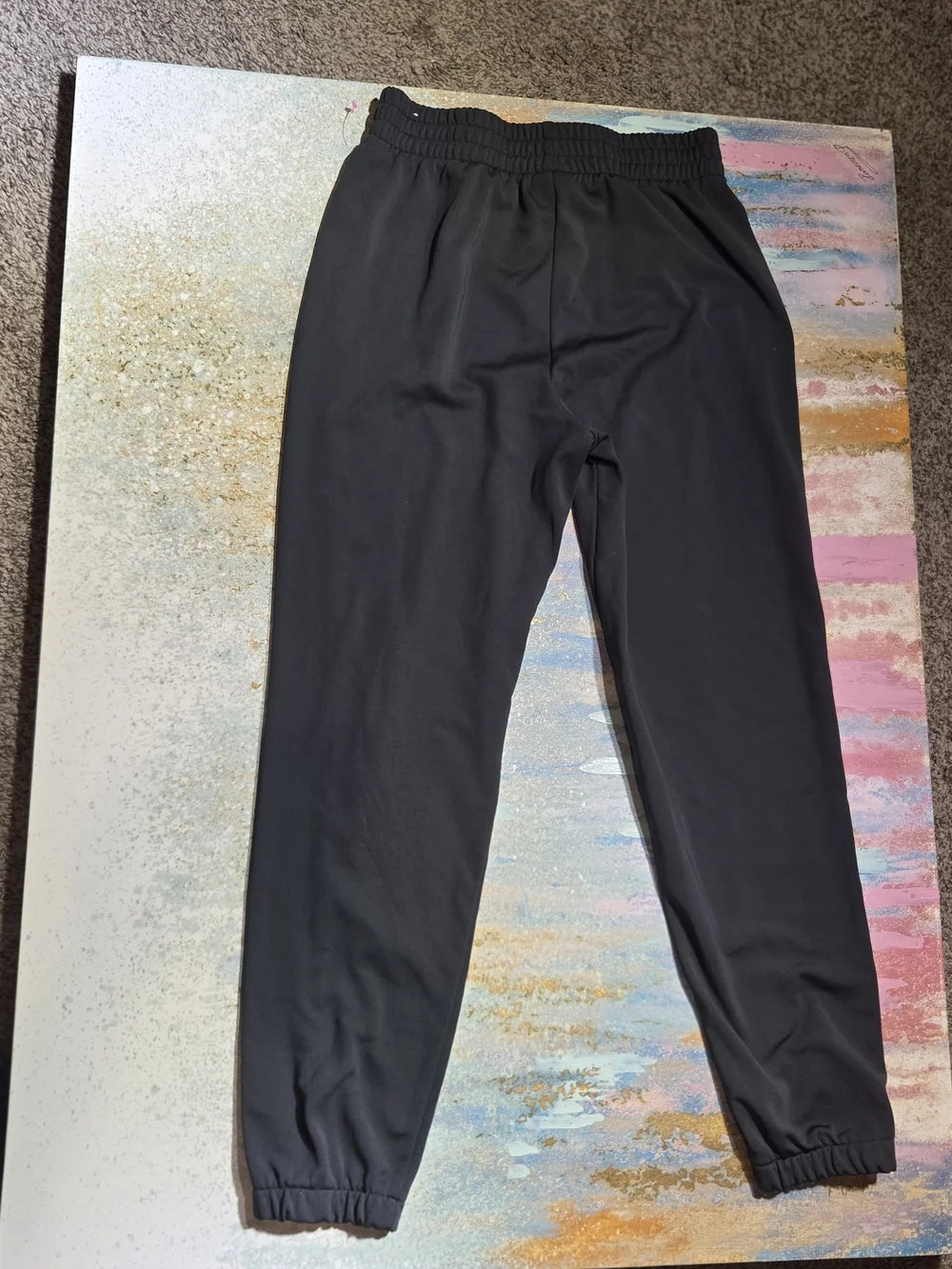 Nike Kids Black Jogger Sweatpants with White Swoosh